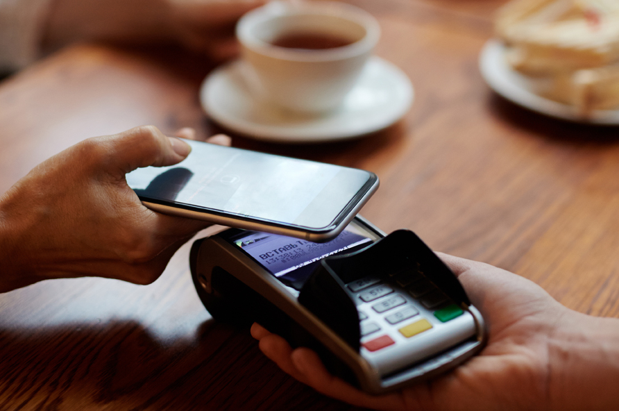 paying with a phone using digital wallet