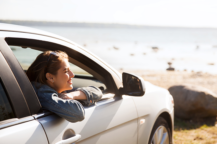 Sitting in first car at the beach