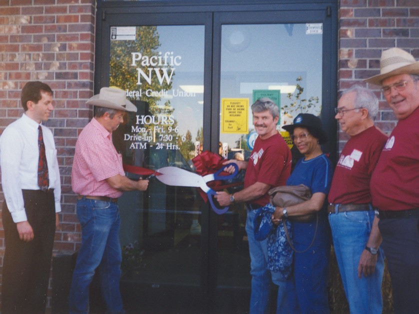 Cutting the ribbon at the grand opening of our Erin Way branch in 2002