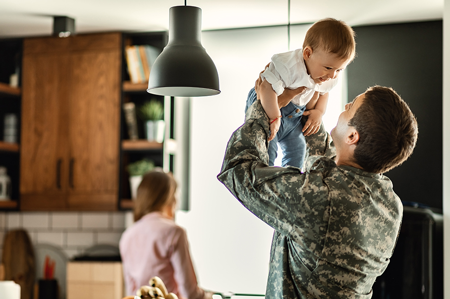 Veteran and family in new house purchased with a VA home loan