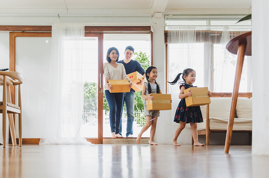 Family moving into new home after getting a broker rebate