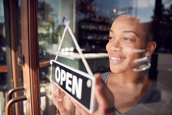 Business owner opening up shop