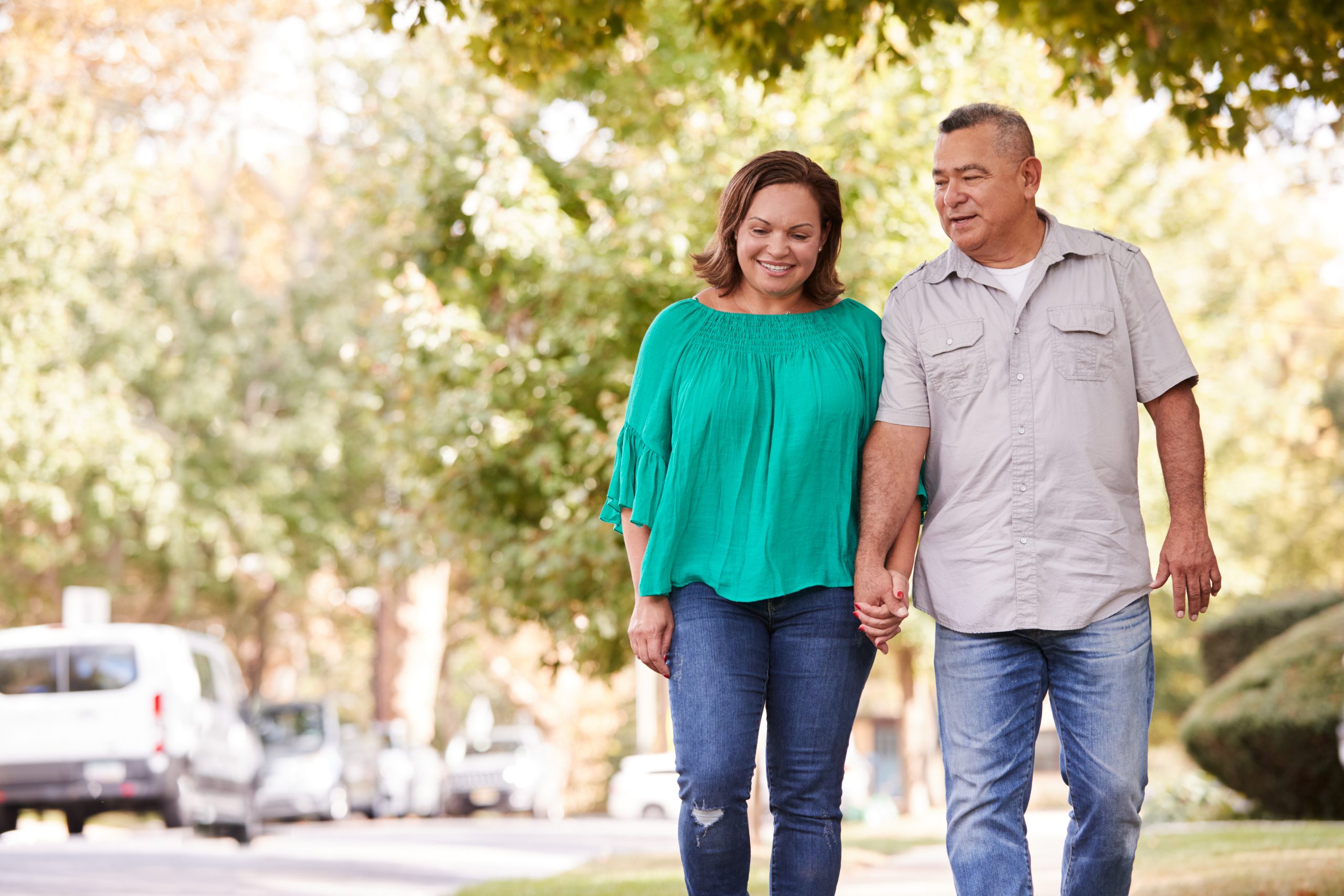 Couple walking and holding hands