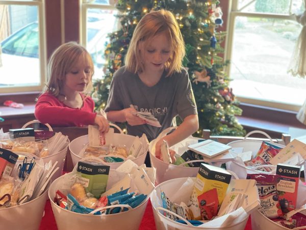 Kids making teacher baskets